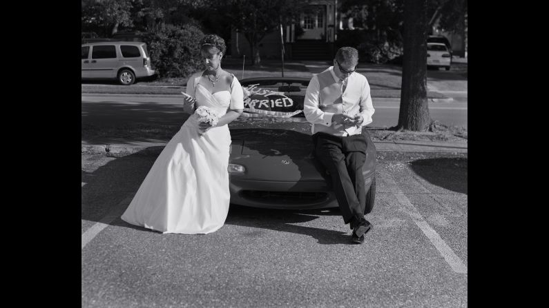Maybe this newly married couple was hyphenating their names on Facebook when Pickersgill asked to take their photo?