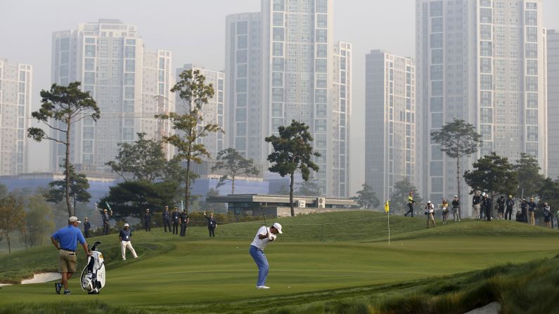 Jason Day, the second-ranked golfer in the world, hits a pitch shot Wednesday, October 7, while practicing for the Presidents Cup golf tournament in Incheon, South Korea. Day and the International team would go on to lose to the United States by one point. The International team hasn't defeated the United States since 1998.
