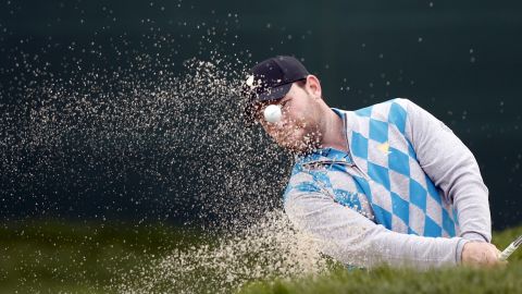 Branden Grace hits a bunker shot during the Presidents Cup on Saturday, October 10.