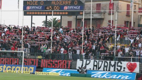 Nice fans display a banner reading 