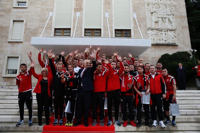 The players salute the fans gathered outside the prime minister's residence. Parties and celebrations took place throughout the entire country.