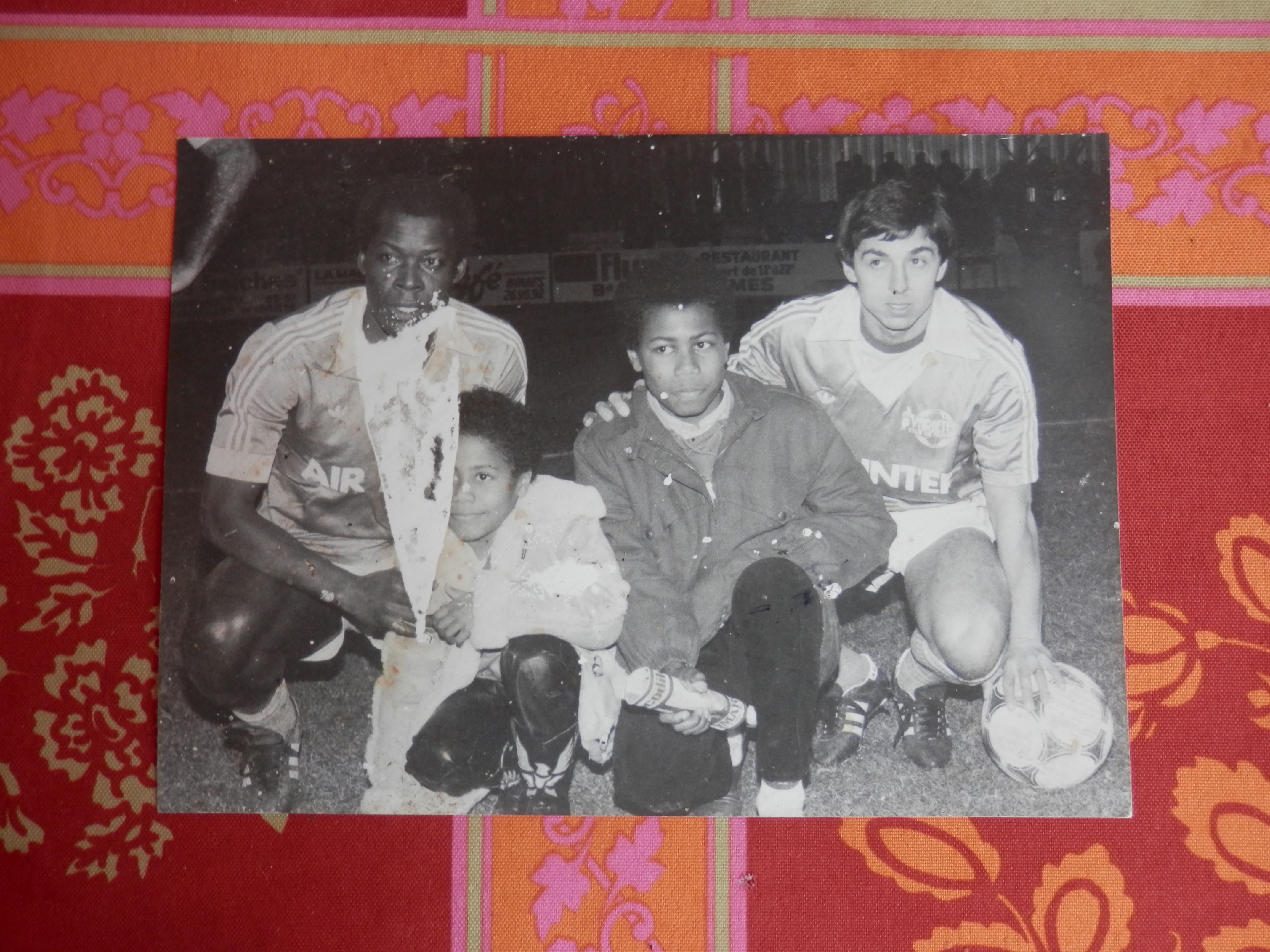 At another tribute game for their father many years earlier, Laurent and Frédéric are pictured alongside Jean-Pierre's former France colleagues Trésor and 1984 European Championship hero Alain Giresse.