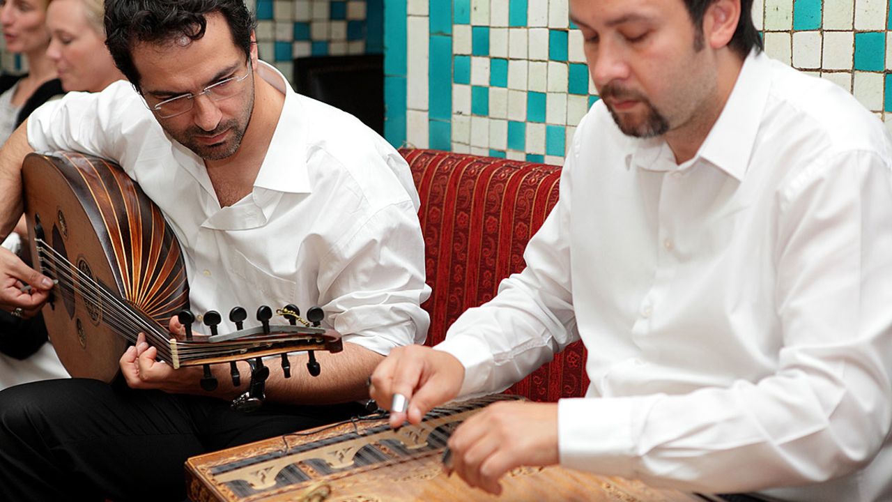 A fasil ekibi (traditional Turkish band) provides additional spirit at a raki gathering.