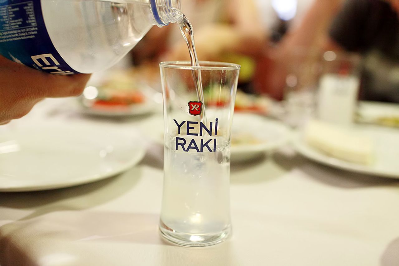 A group of first-timers should ask for a 35-centiliter bottle of raki -- one-third of a liter -- and tell the waiter you each want a tek (4cl) -- about one shot.  Raki is always served with chilled water, although some fans say ice diminishes the flavor of the drink. 