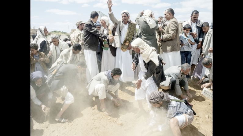 A funeral is held for two men in Sanaa.