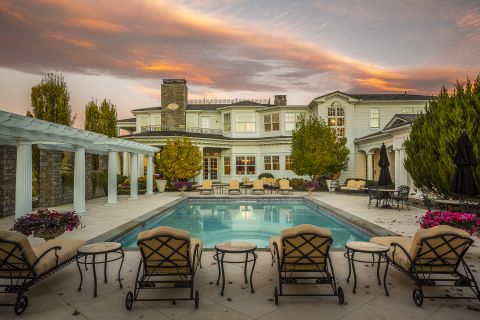 The luxurious property in Boulder, Colorado is set in 117 acres and includes this impressive outside swimming pool. 