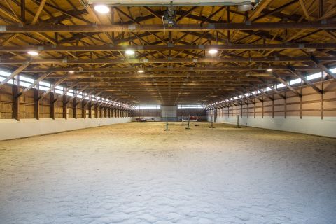 It is described as a "premium working ranch" by Sotheby's International Realty, and includes an Olympic-size riding ring and a 12 stall barn. 