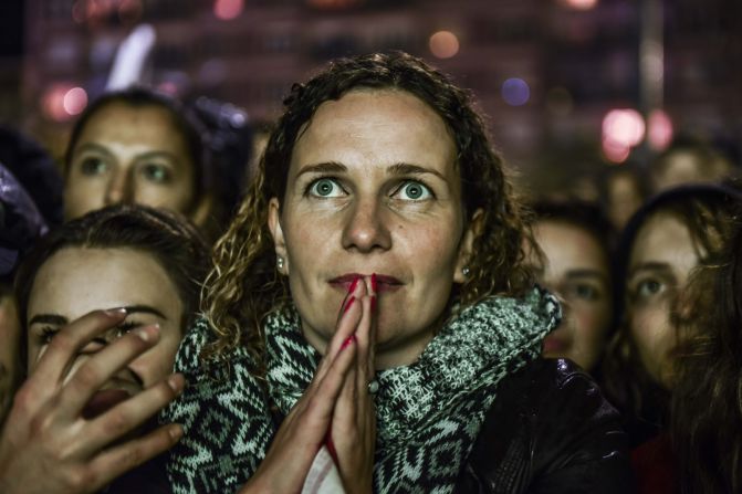 Kosovo fans watch on a big screen in Pristina on October 8 the Euro 2016 qualifying football match between Albania and Serbia played at the Elbasan Arena in Elbasan, Albania.