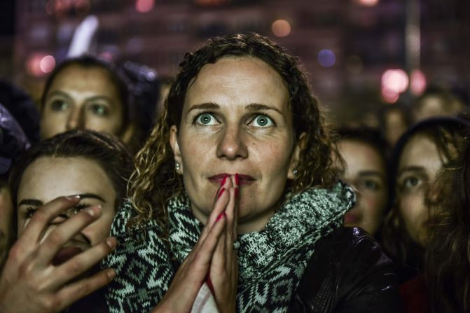 Kosovo fans watch on a big screen in Pristina on October 8 the Euro 2016 qualifying football match between Albania and Serbia played at the Elbasan Arena in Elbasan, Albania.