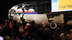 The wreckage of the Malaysia Airlines flight  MH17 is exhibited during a presentation of the final report on the cause of the its crash at the Gilze Rijen airbase October 13, 2015. Air crash investigators have concluded that Malaysia Airlines flight MH17 was shot down by a missile fired from rebel-held eastern Ukraine, sources close to the inquiry said today, triggering a swift Russian denial. The findings are likely to exacerbate the tensions between Russia and the West, as ties have strained over the Ukraine conflict and Moscow's entry into the Syrian war.   AFP PHOTO / EMMANUEL DUNAND        (Photo credit should read EMMANUEL DUNAND/AFP/Getty Images)