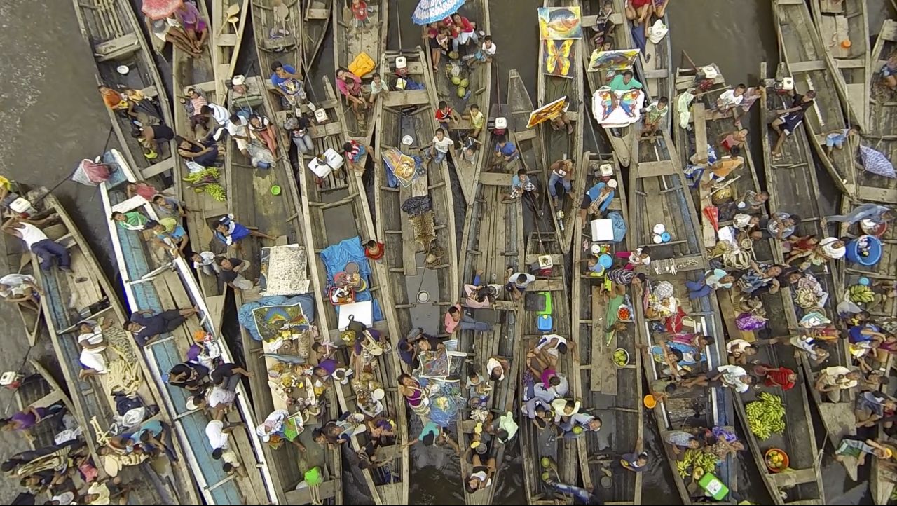 "Here is a picture of a group of vendors who wanted to sell things at the end of our boat," said photographer Moritz Ot of this image taken in the port city of Iquitos, on the banks of the Amazon River in Peru.