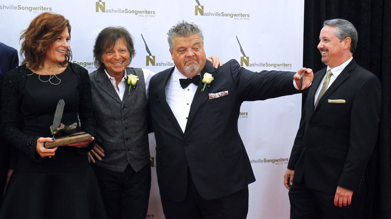 Craig Wiseman takes a selfie with fellow songwriters Rosanne Cash and Even Stevens at the Nashville Songwriters Hall of Fame Dinner on Sunday, October 11. The three were inducted into the Hall of Fame along with Mark James, not pictured.