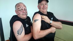 Craig Lockwood (left) and Grant Duder show off their tattoos.