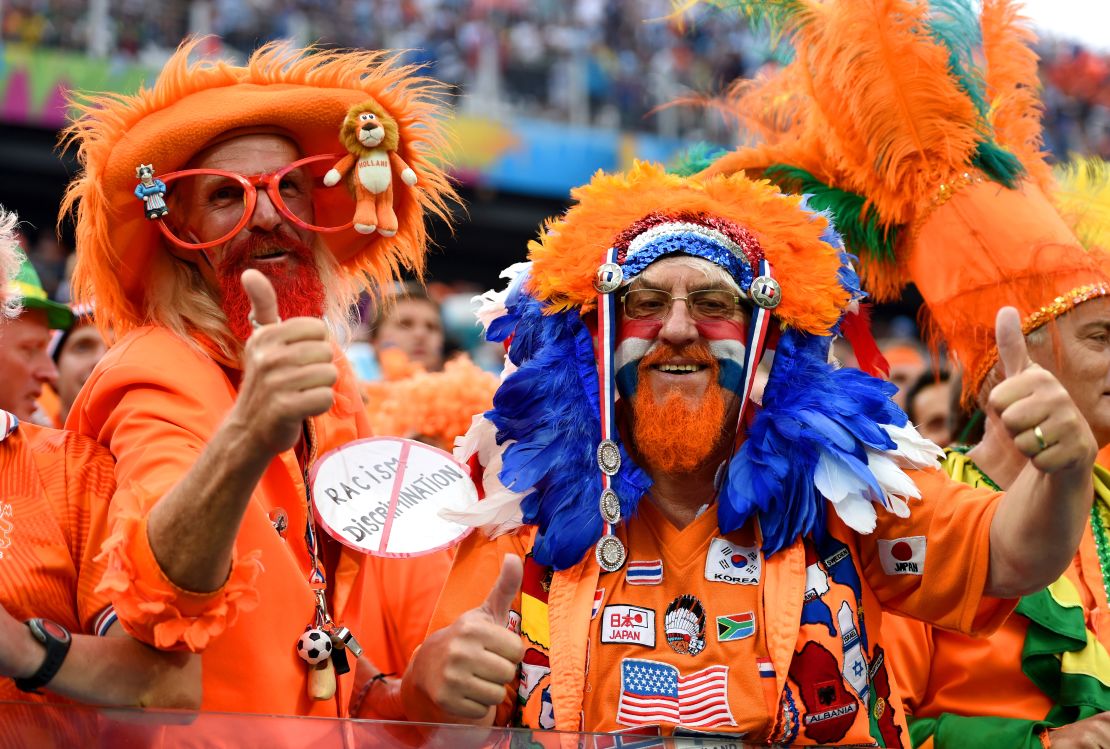 Fans dress in orange, in support of the Netherlands.