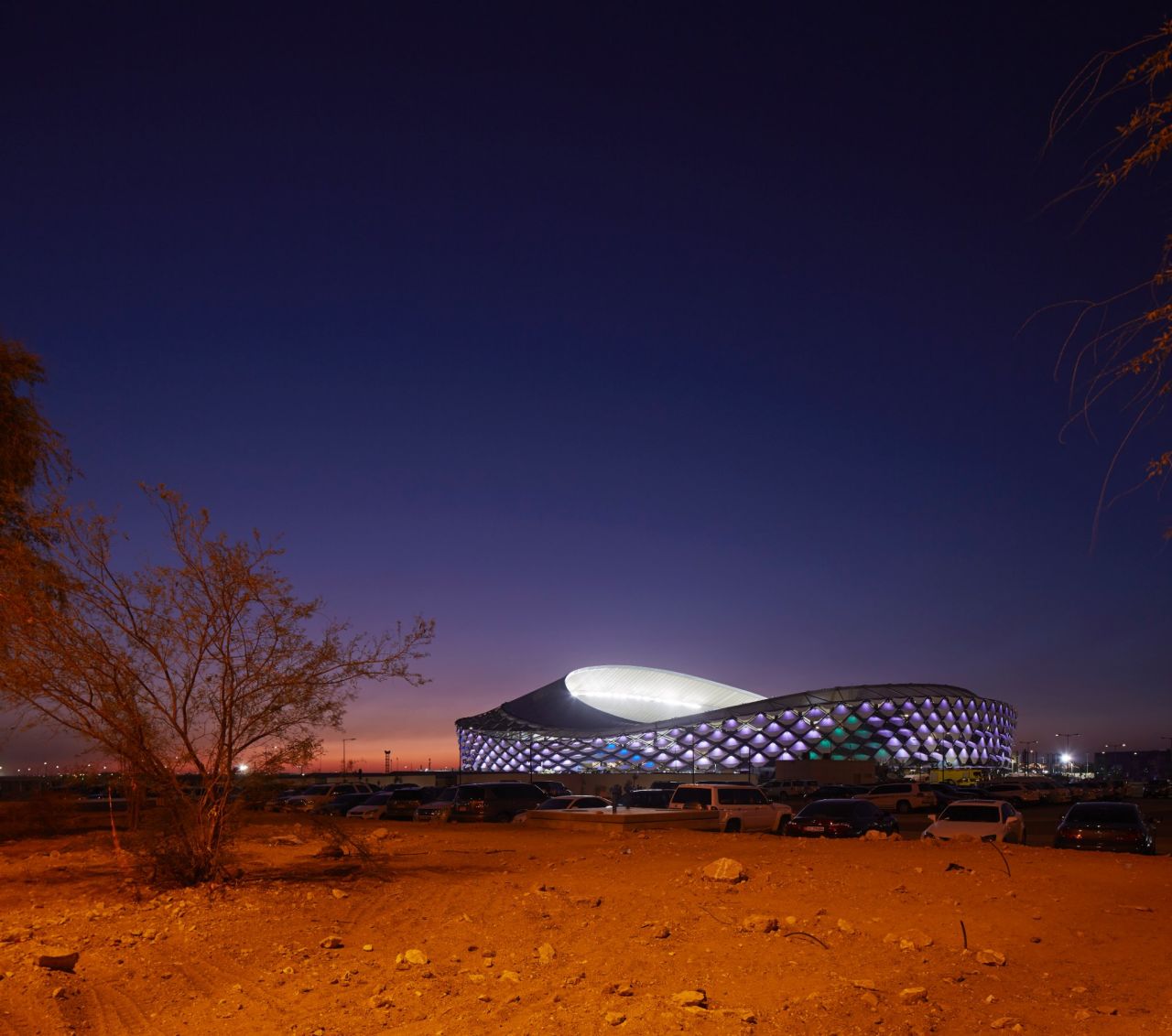 One of Pattern Design's main challenges was to create a structure that could withstand the hot and dry climate of Al Ain. The sinuous and gravity-bending parasol roof is inspired by the Arabic headdress. The roof's design is a departure from traditional European stadium roofs -- which are intended for wetter climates. This one shades spectators, but allows for enough sunlight to hit the pitch. The firm is currently designing Al Rayyan Stadium for the 2022 FIFA World Cup in Qatar.