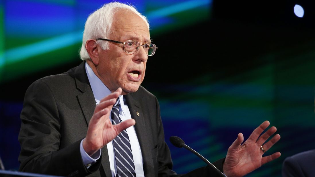 Sanders speaks during the debate. CNN's Mark Preston said Sanders' opening remarks "hit on all of the hot-button liberal issues: Take back the government from billionaires, climate change. He all but said it is time for a revolution."