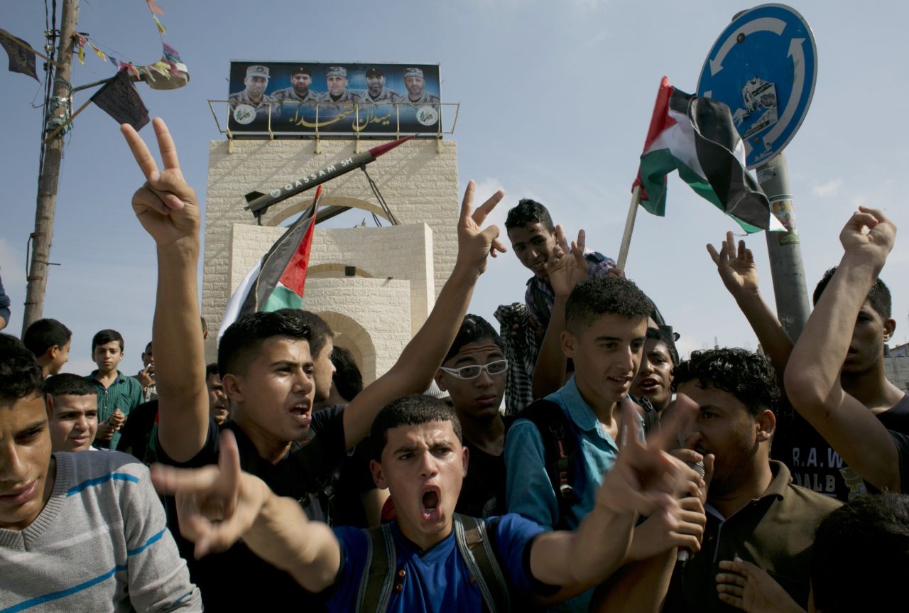 Palestinians take part in an anti-Israel protest in the southern Gaza city of Rafah on October 13.
