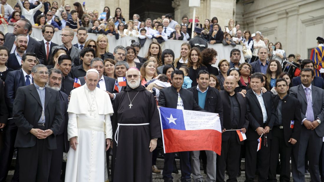 Pope Francis meets with some of the 33 Chileans who were rescued from the 2010 mining accident. The miners, who are in Rome promoting a new film about their ordeal, posed for photos and presented gifts to Francis at the Vatican on Wednesday, October 14.