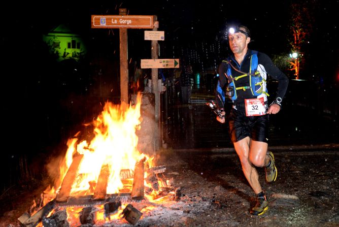 Running through the night, competitors in the Ultra Marathon Mont Blanc will have to negotiate seven valleys, 71 glaciers and 400 summits -- plus 9,400 meters of altitude.<br />