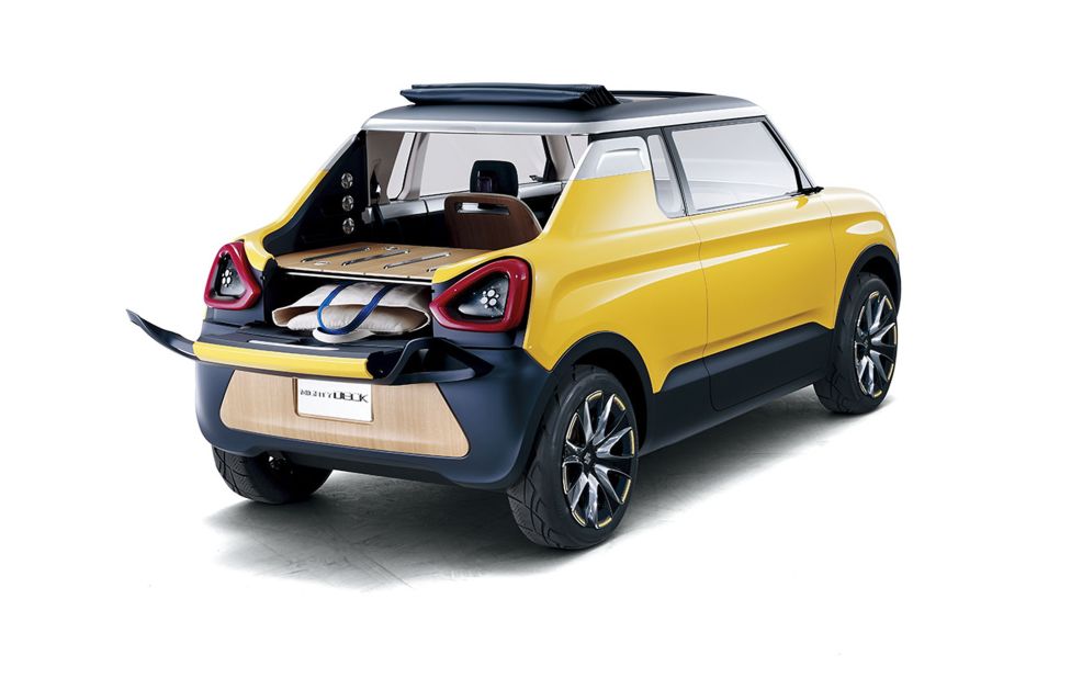 Suzuki's Mighty Deck concept is billed as a "fun-oriented minicar with a canvas top and an open load deck that can be repositioned for diverse purposes."