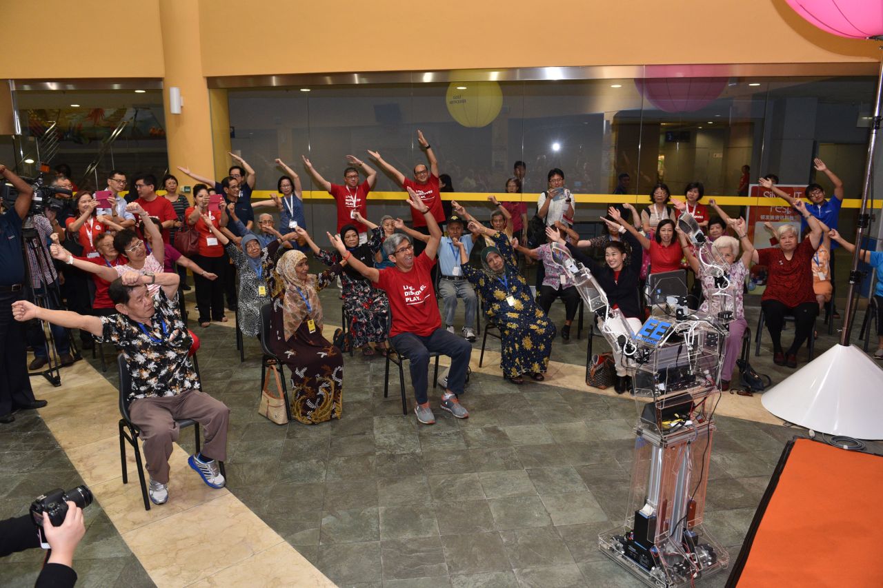 The Robocoach leads elderly people at a senior center in Singapore in a series of arm exercises. The Asian city state is rolling out robotic coaches to 25 senior centers as it looks for technological solutions to a fast aging society.  