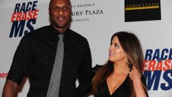 Lamar Odom and Khloe Kardashian-Odom pose on arrival for the 19th Annual Race to Erase MS themed 'Glam Rock to Erase MS' in Los Angeles on May 18, 2012.