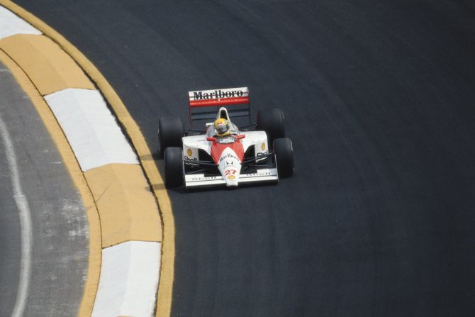 Ayrton Senna is pictured on track at the 1990 Mexican Grand Prix. The Brazilian suffered a crash at the track's famous Peraltada Corner in 1991. Today's circuit configuration no longer features the long, sweeping high-speed turn. 