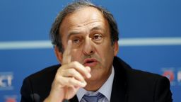 UEFA chief Michel Platini gestures as he speaks during a UEFA press conference after the draw for the UEFA Europa League football group stage 2015/16 on August 28, 2015 in Monaco.  AFP PHOTO / VALERY HACHE        (Photo credit should read VALERY HACHE/AFP/Getty Images)