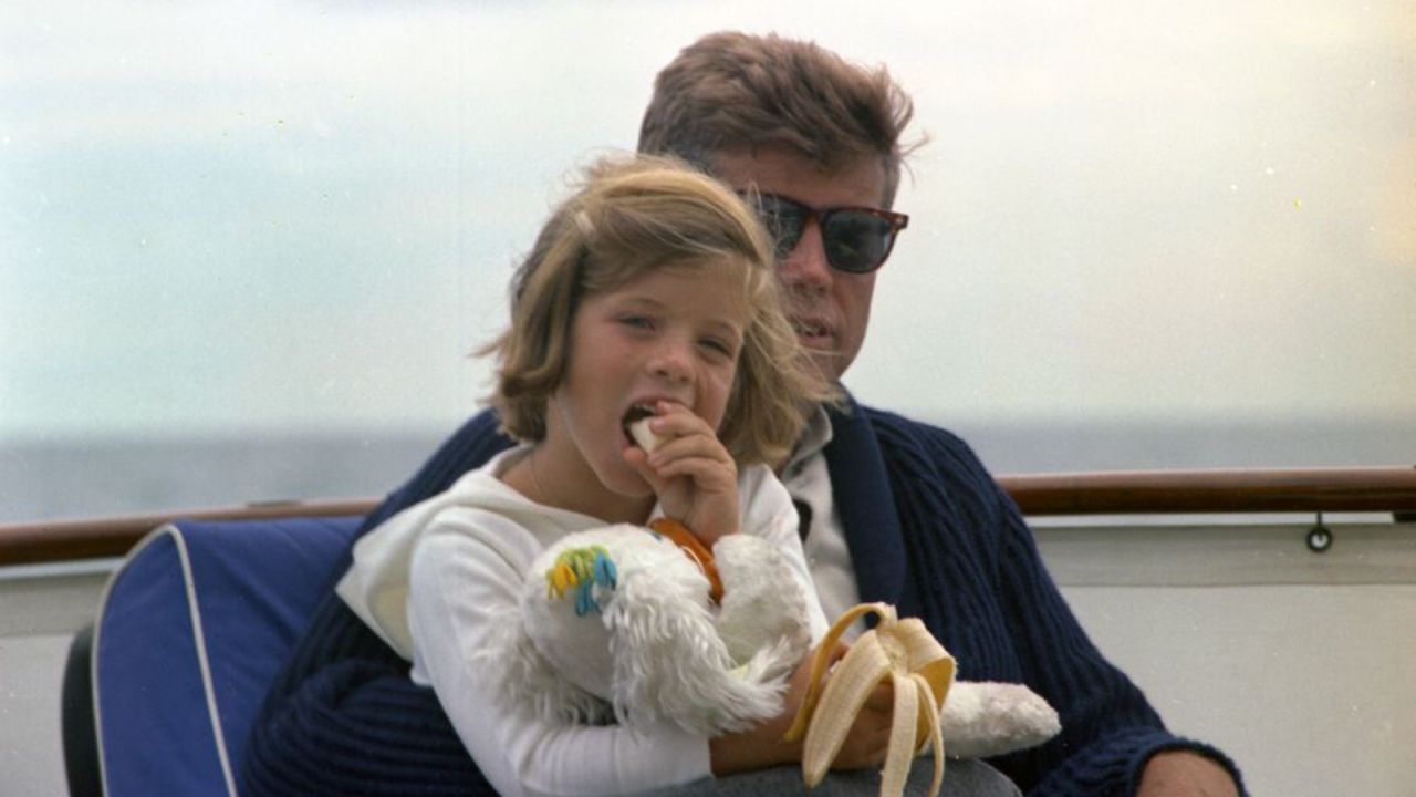 Kennedy with daughter Caroline off the coast of Hyannis Port, Massachusetts.