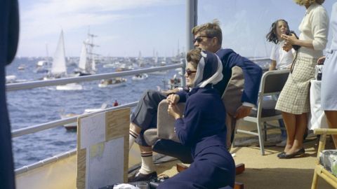 Kennedy and Jacqueline watch the first race of the 1962 America's Cup off Newport, Rhode Island.