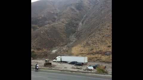 Efren Munoz Jr. took this photo Thursday when he became stuck in mud on Interstate 5 in the Tehachapi Mountains, a highway known locally as "the grapevine."