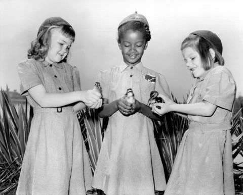 <strong>1950s:</strong> An integrated group of Girl Scout Brownies learned farming firsthand, circa 1950. It wasn't just a fluke. In 1956, the Rev. Martin Luther King Jr. called the Girl Scouts  <a href="http://www.girlscoutshs.org/blog/posts/a-martin-luther-king-jr-day-message-from-anna-maria-chvez" target="_blank" target="_blank">a "force for desegregation." </a>Today, that principle extends to <a href="http://www.cnn.com/2015/05/20/living/girl-scouts-welcomes-transgender-girls-feat/">transgender girls</a>. 