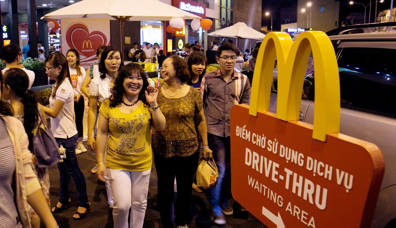 Vietnam has opened its doors to some international conglomerates. Vietnam's first McDonald's opened in Ho Chi Minh City in 2014, serving over 400,000 people in its first month, while the country's first Starbucks opened here in 2013. 