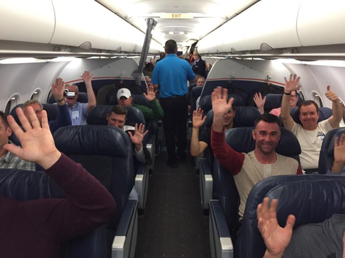 Passengers fly the final US Airways flight from San Francisco to Philadelphia.