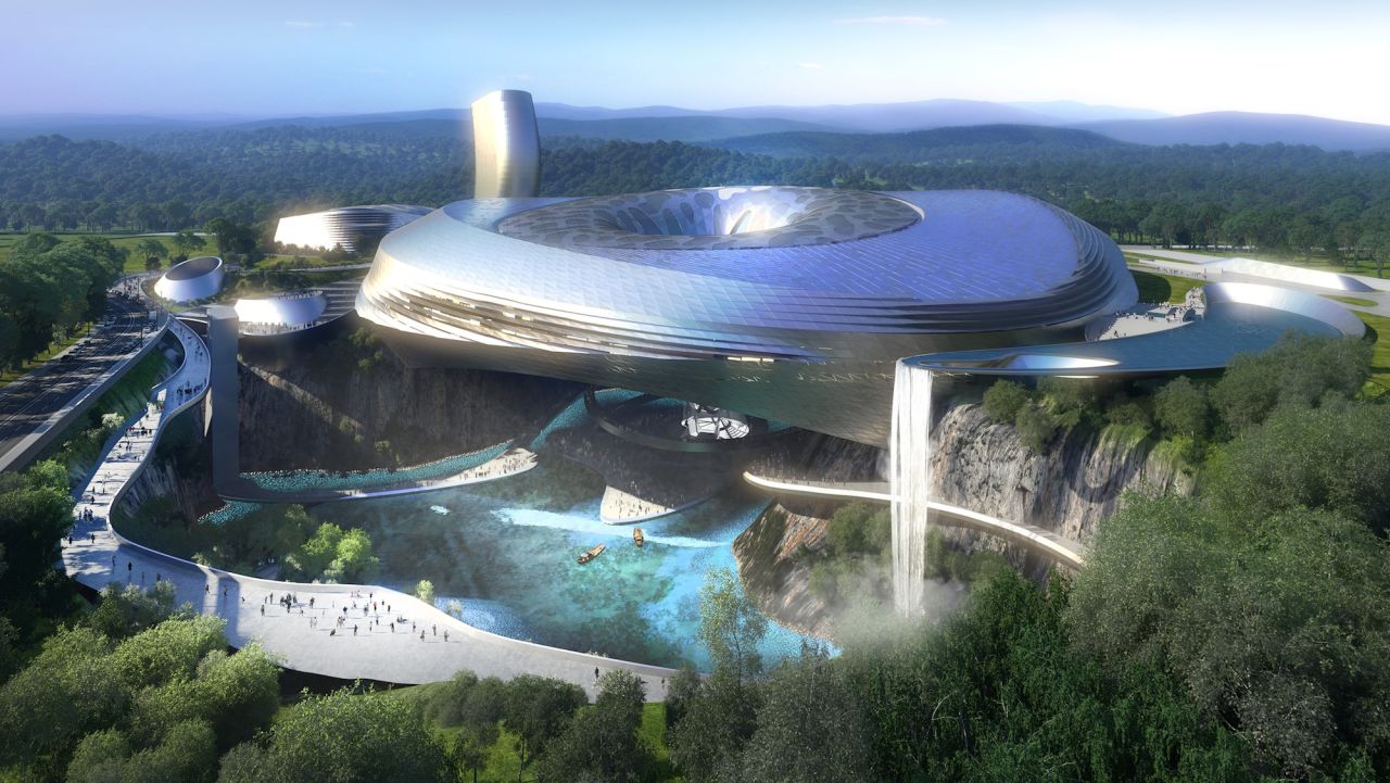 The Deep Pit Ice and Water World, part of the forthcoming Dawang Mountain Resort near Changsha, will be partially suspended over a quarry pit with two contrasting environments: a lake with sunken gardens below and an indoor snow center above. A separate 100-meter-high tower will house a five-star hotel with 330 suites. It's due for completion in 2016. 