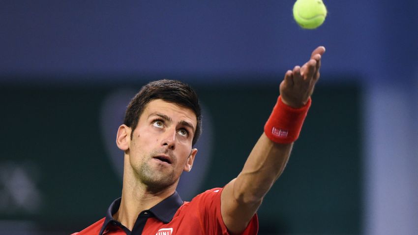 Novak Djokovic of Serbia serves during his men's singles semi-final match against Andy Murray of Britain at the Shanghai Masters tennis tournament in Shanghai on October 17, 2015.