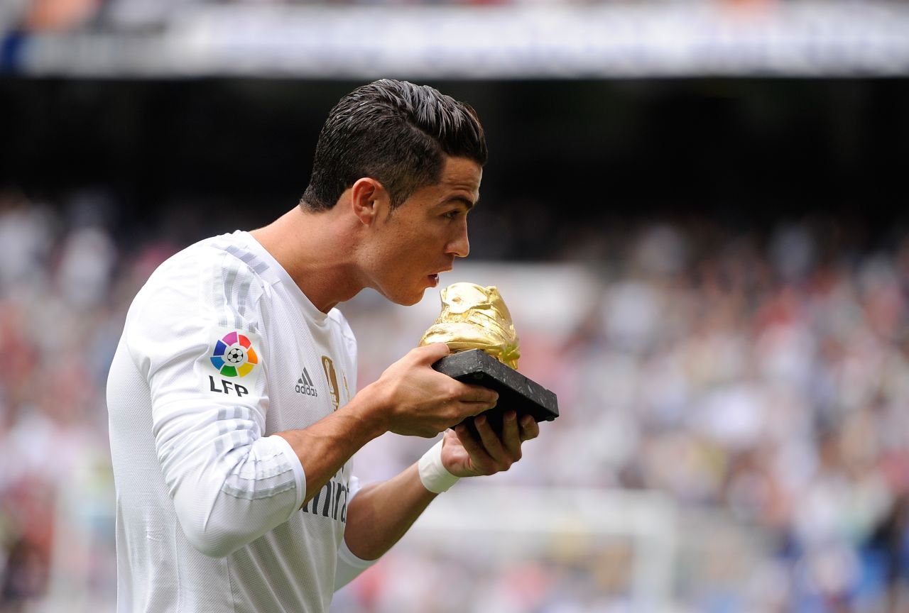 <strong>October 17, 2015:</strong> Cristiano Ronaldo poses with his Golden Shoe award for the 2014/15 season prior to the La Liga match between Real Madrid  Levante at the Santiago Bernabeu stadium. The golden shoe is the annual award given to Europe's leading goalscorer.