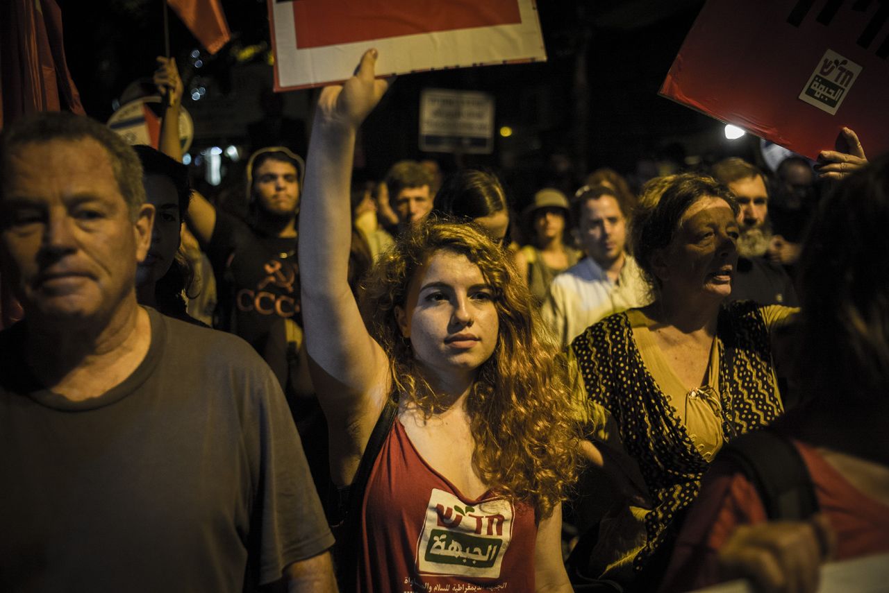 Left-wing activists march on Saturday, October 17, in Jerusalem. About 2,000 participants took part in an Arab-Israeli demonstration for peace. Israeli police and security forces remain on high alert around Israel and the West Bank.
