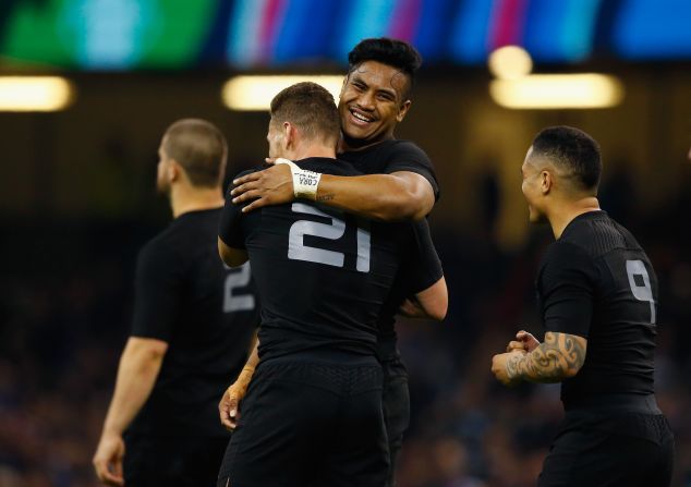 New Zealand players celebrate after thrashing France in the 2015 Rugby World Cup quarter final in Cardiff.