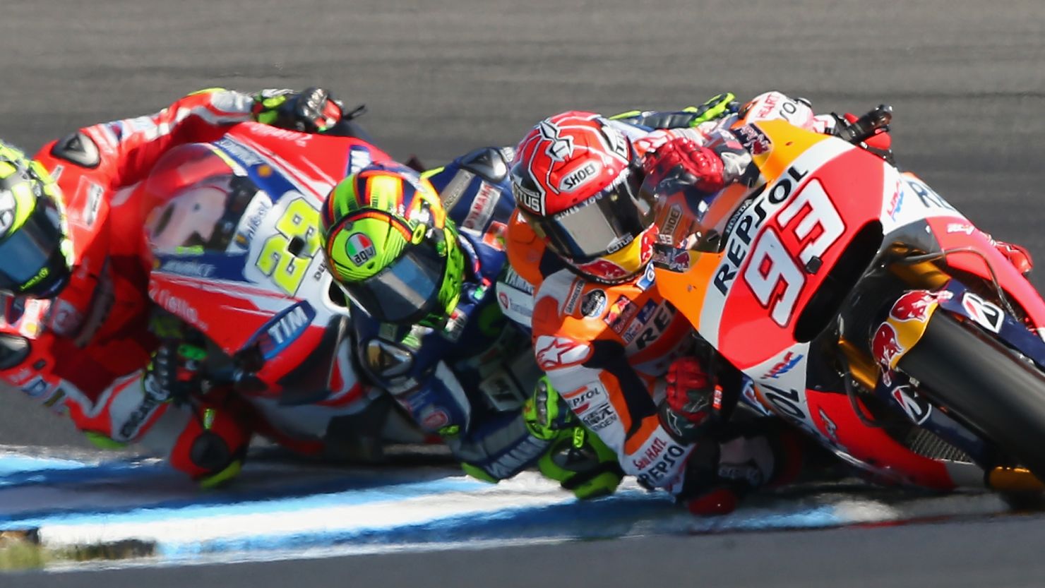 Marc Marquez of Spain leads on his Repsol Honda in a tightly contested Australia MotoGP at Phillip Island. 