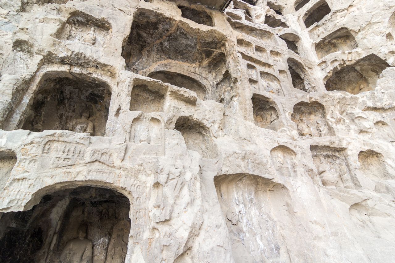 The Longmen Grottoes are located in Hunan province. The grottoes contain a large collection of Chinese art from the Northern Wei and Tang Dynasties and are all devoted to Buddhism. The Longmen Grottoes are currently protected as a UNESCO World Heritage Site.