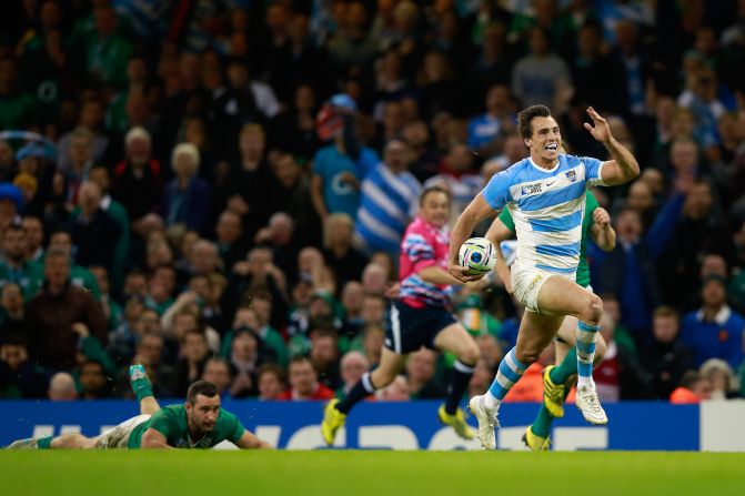 Juan Imhoff of Argentina races clear to score his side's fourth and clinching try in the thumping victory over Ireland in Cardiff.