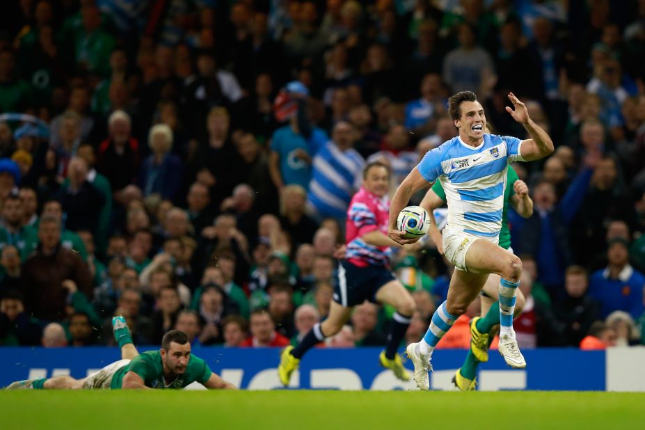Juan Imhoff of Argentina races clear to score his side's fourth and clinching try in the thumping victory over Ireland in Cardiff. 