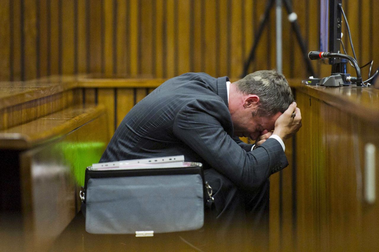 Pistorius puts his head in his hands during his trial in South Africa in March 2014. Pistorius often showed great emotion as the court went into detail about Steenkamp's death.