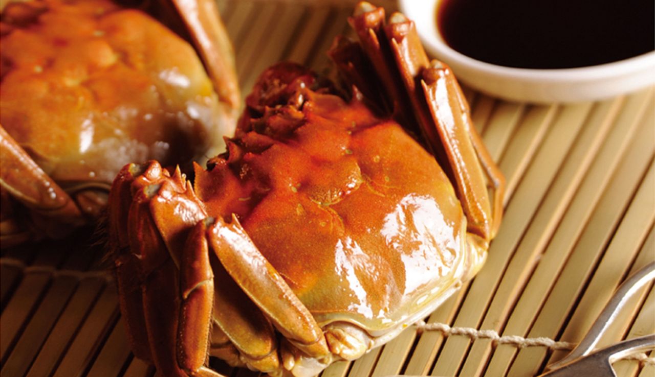 Pull the legs and claws off before prising open the shell.
