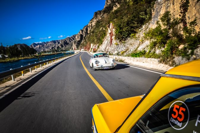 The road became more and more beautiful as we climbed from plains to mountains. A 1963 Porsche 356 followed us along a river. 