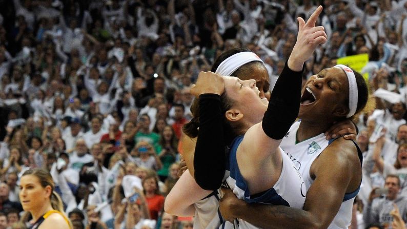 Members of the Minnesota Lynx -- from right, Sylvia Fowles, Maya Moore and Lindsay Whalen -- celebrate after the Lynx won the WNBA championship on Wednesday, October 14. Fowles was named Finals MVP. Minnesota has now won three titles in five years.