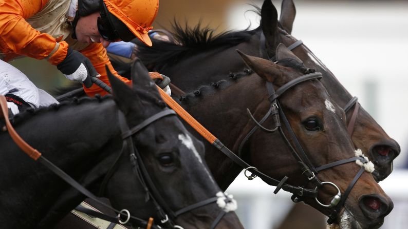 Noel Fehily rides Isaac Bell to victory during a hurdle race in Huntingdon, England, on Tuesday, October 13.