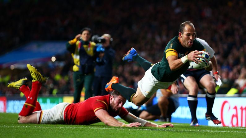 South Africa's Fourie du Preez scores a try against Wales during a Rugby World Cup quarterfinal match on Saturday, October 17. South Africa advanced with a 23-19 victory.