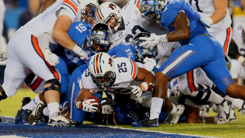 Auburn running back Peyton Barber reaches over the goal line to score at Kentucky on Thursday, October 15. Barber had two touchdowns in the game as Auburn won 30-27.